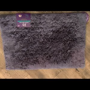 Joy Mangano small bath rug. Plush